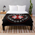 Umbrella Corporation inspired plush blanket with horror and gaming elements