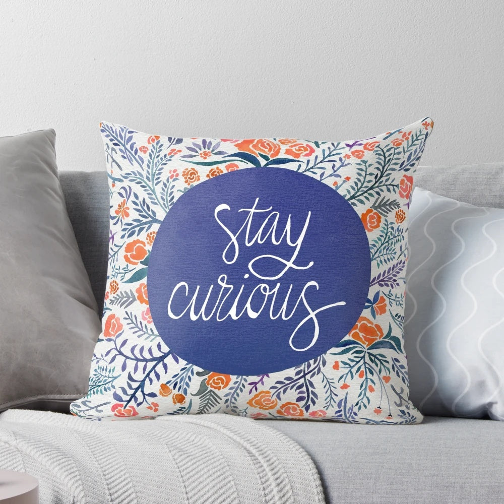 Navy and coral floral watercolor 'Stay Curious' throw pillow