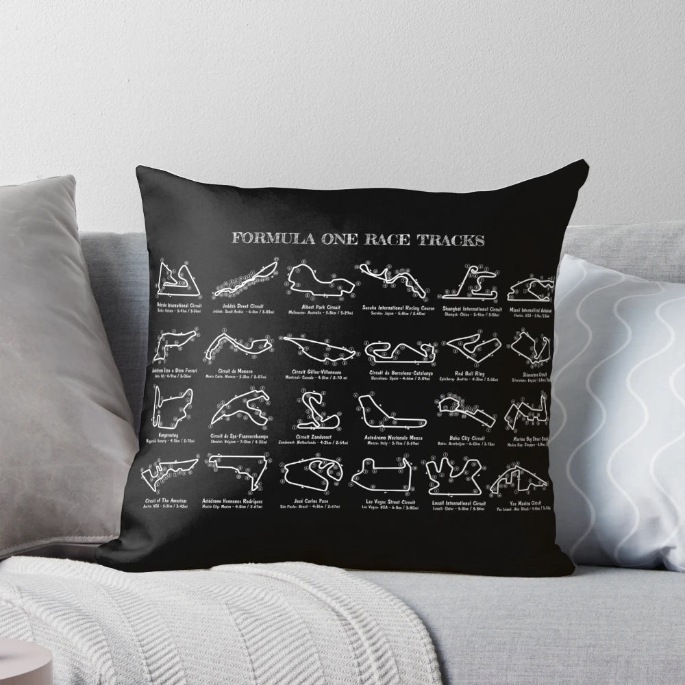 White stencil-style graphic of an F1 race track printed on a throw pillow.