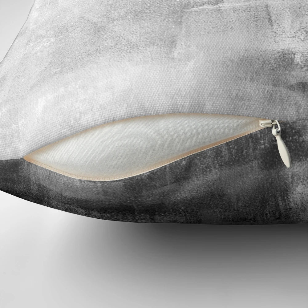 Gray abstract art pillow with minimalist brush stroke design