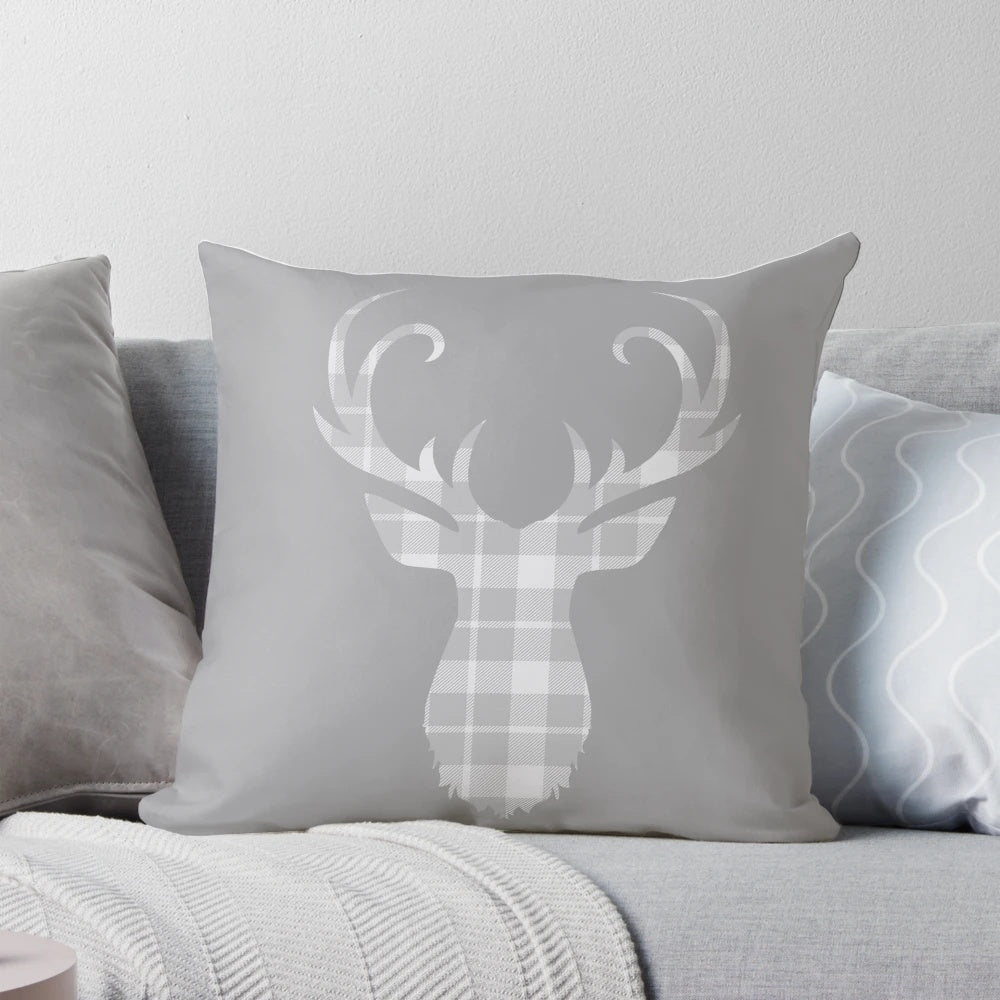 Grey tartan pillow with a stag head design, a classic country and vintage-inspired home decor accent.