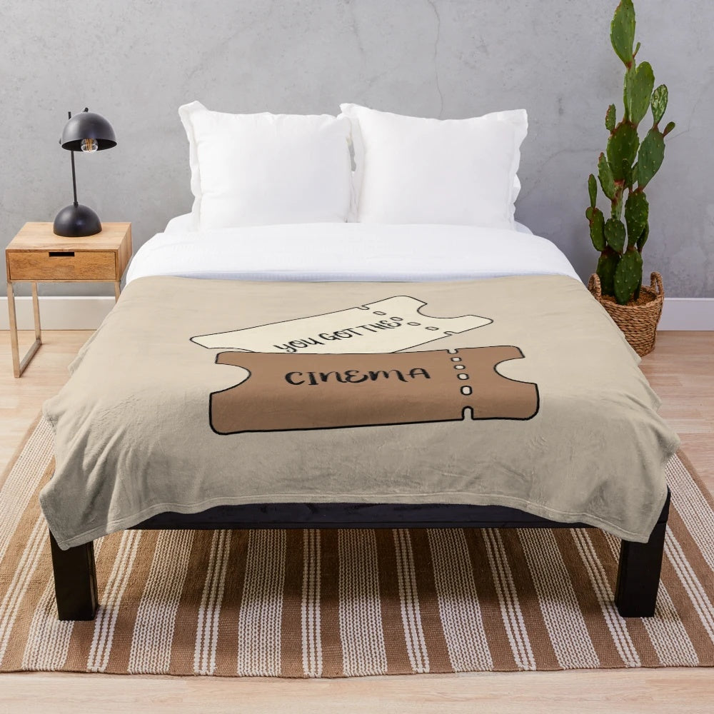 Harry Styles themed plush blanket featuring cinema tickets and movie-inspired designs