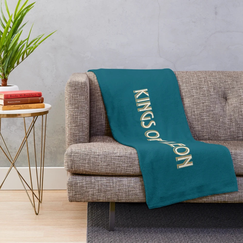 Kings of Leon-inspired plush blanket featuring the band's iconic logo and galaxy-inspired design