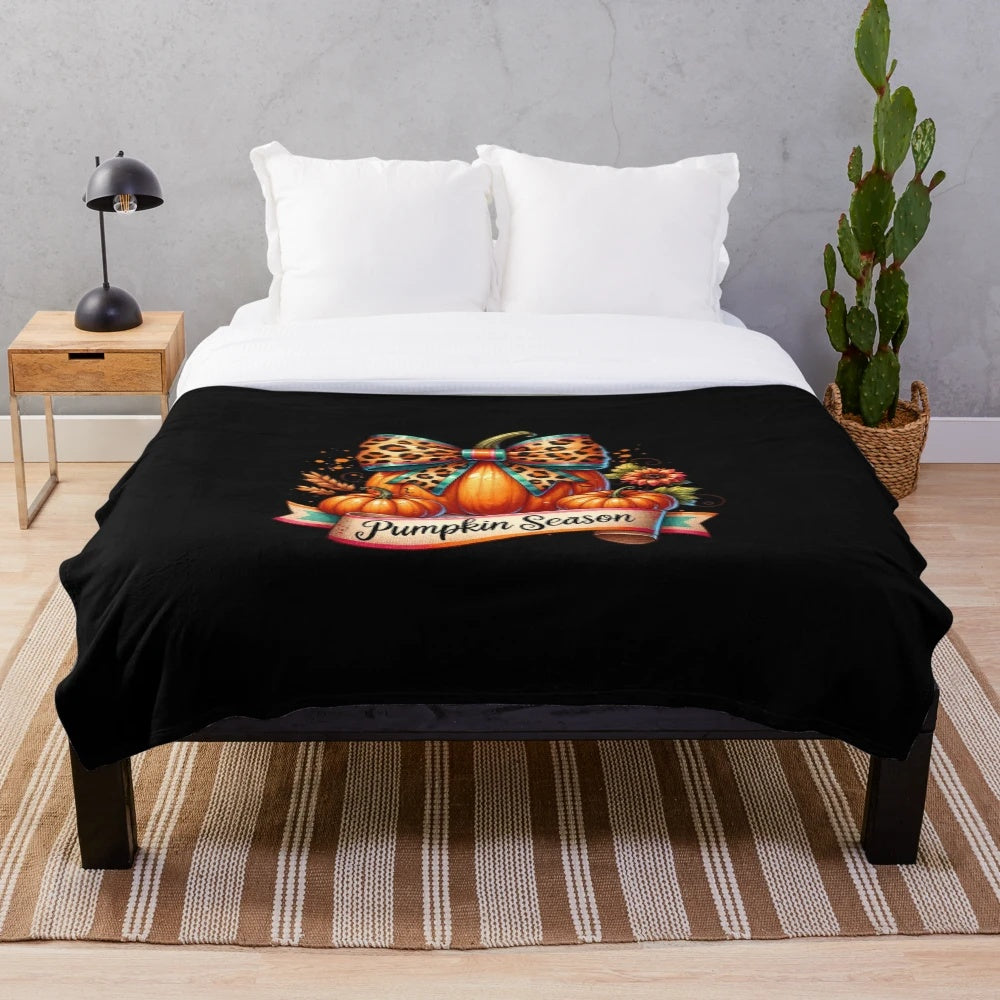 Leopard print pumpkin design on a cozy plush blanket