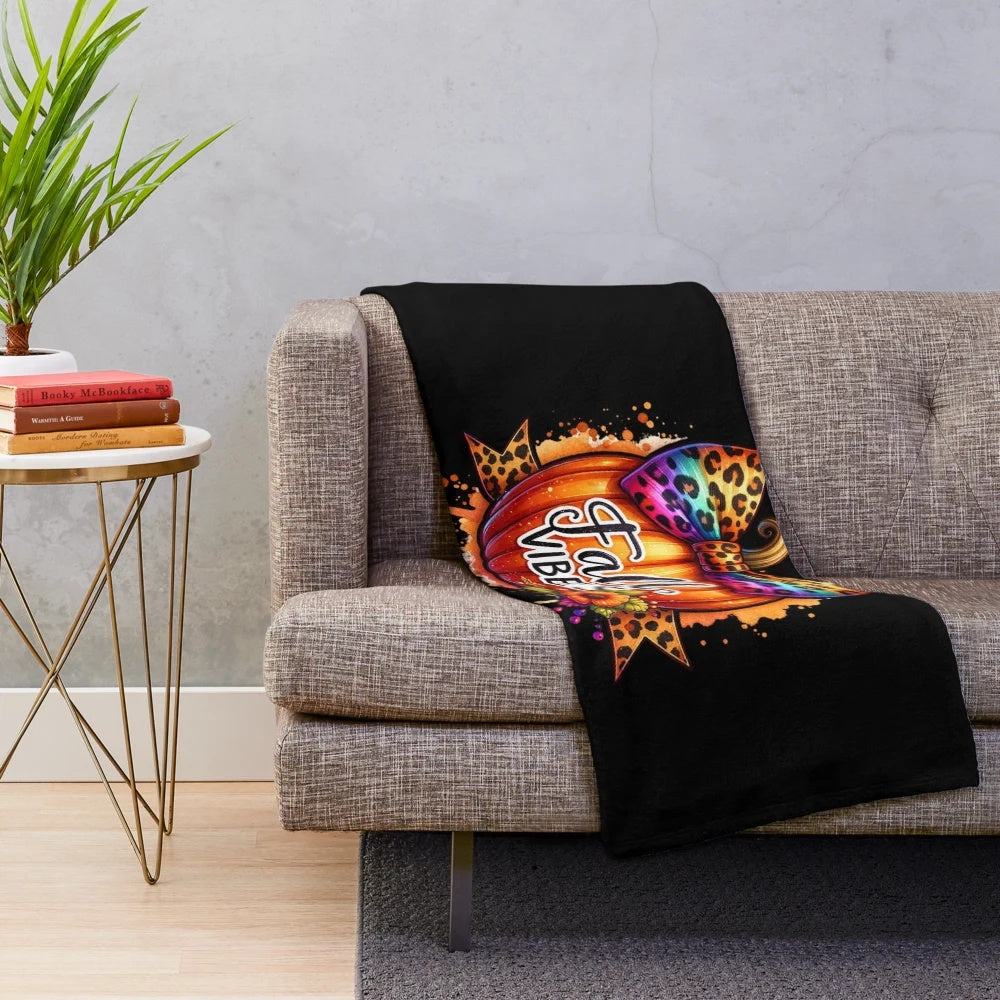Leopard print pumpkin watercolor art on a soft plush blanket