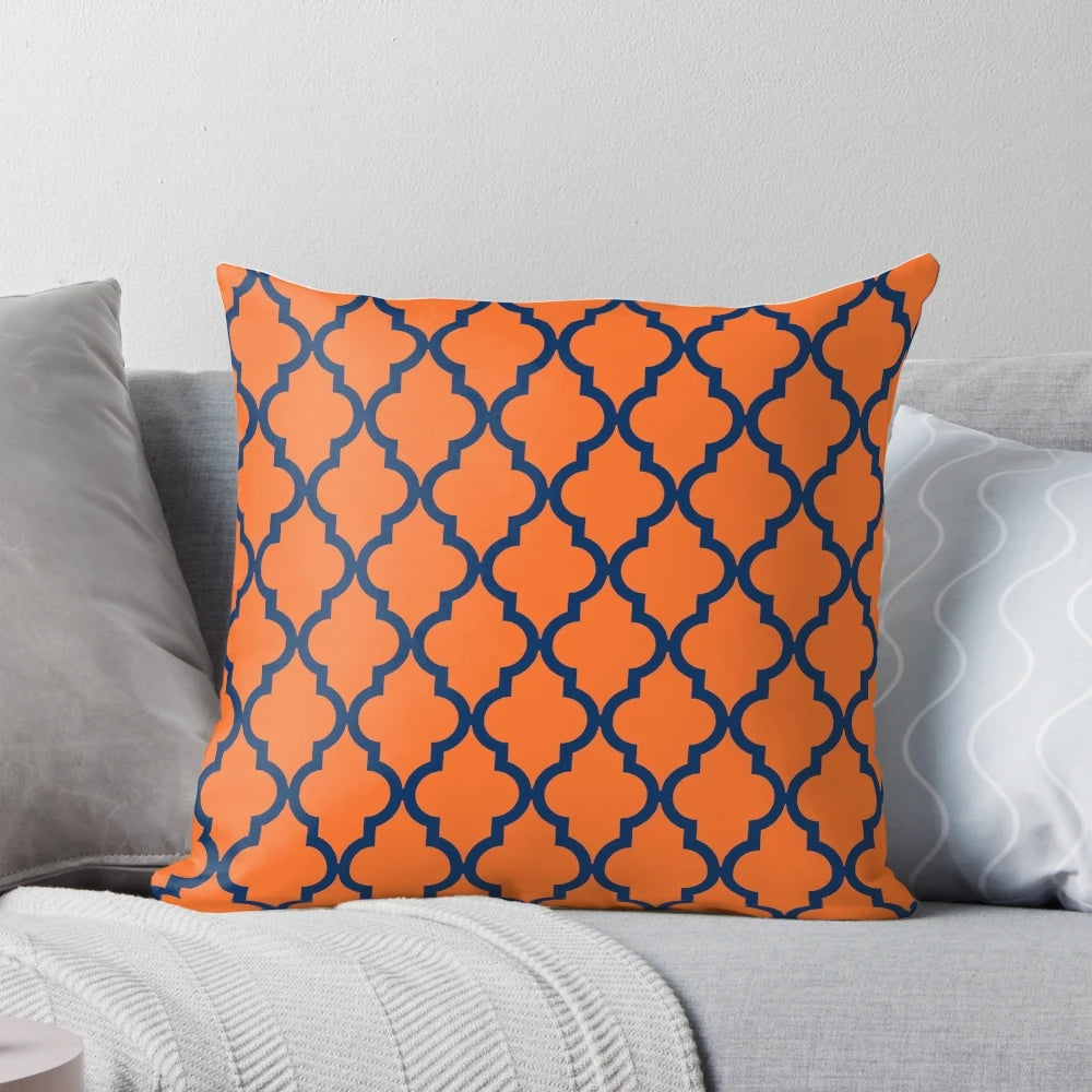 Moroccan-inspired navy blue and orange patterned decorative throw pillow