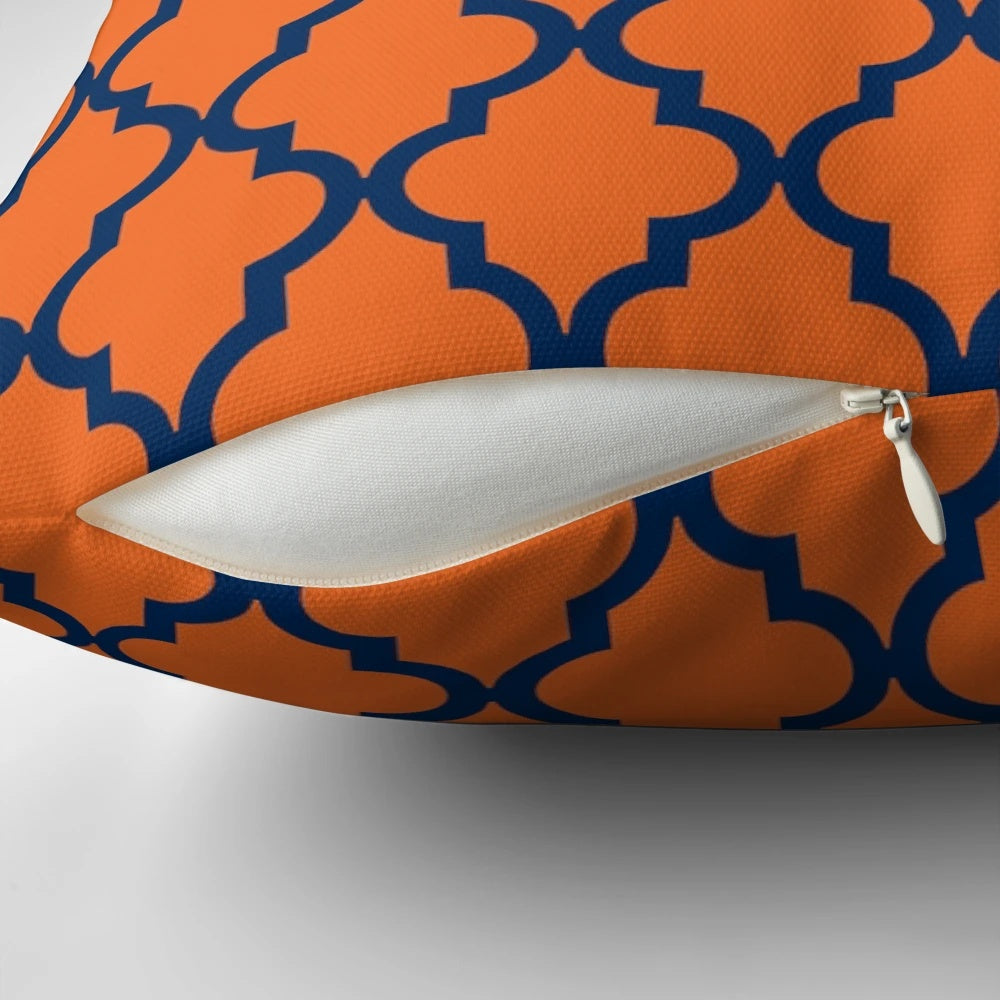 Moroccan-inspired navy blue and orange patterned decorative throw pillow