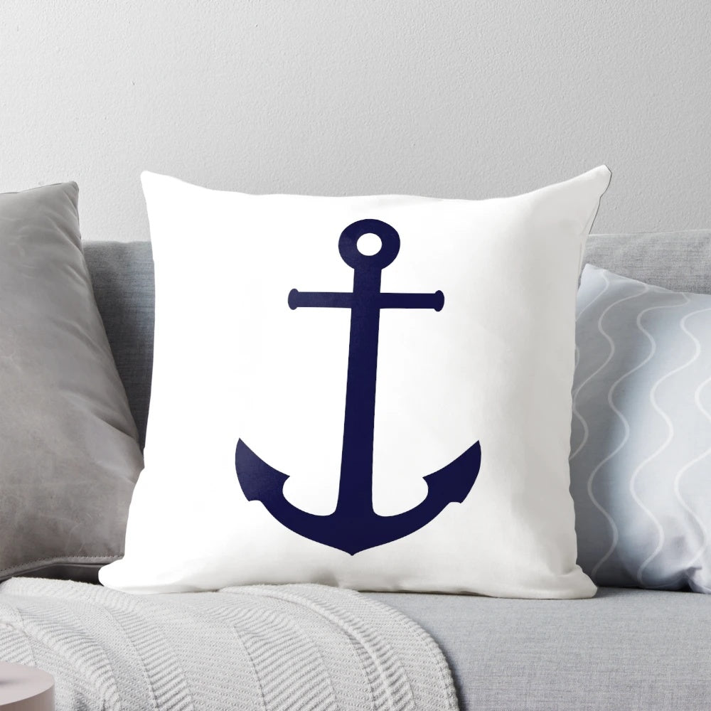 Navy blue anchor-themed pillow against a white background