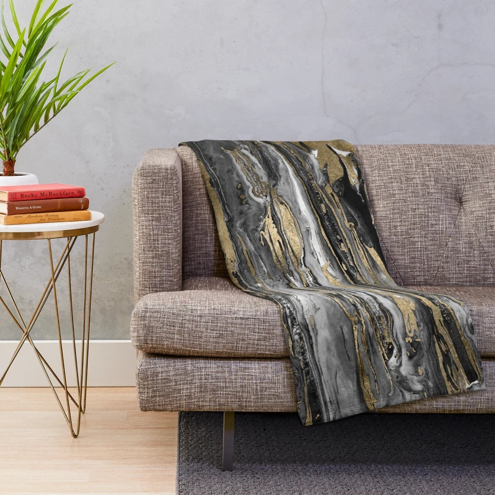Stylish plush abstract marble blanket with gold and black design
