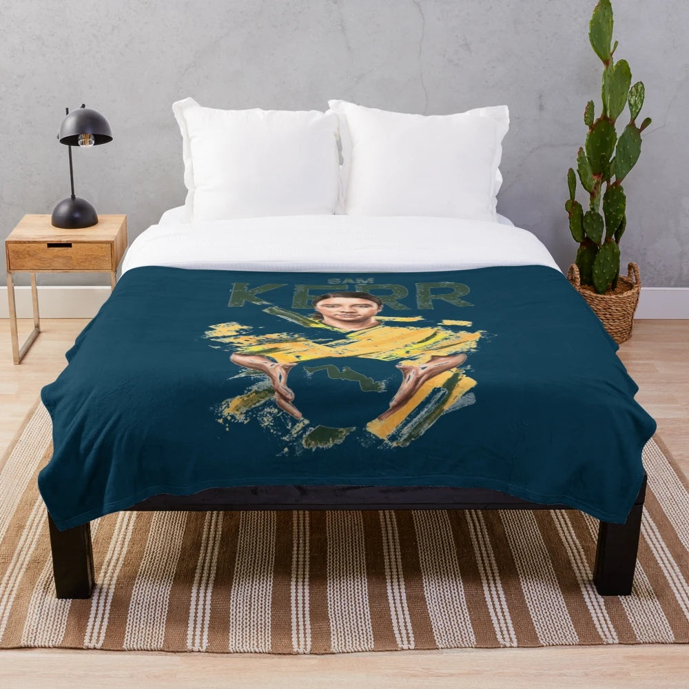 Plush blanket depicting Sam Kerr's famous backflip celebration