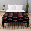 Plush blanket with a classic Triumph TR3 sports car design