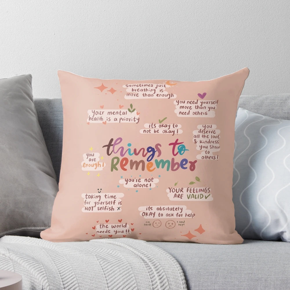 A cozy pillow with mental health reminders and affirmations to promote self-care and wellbeing.