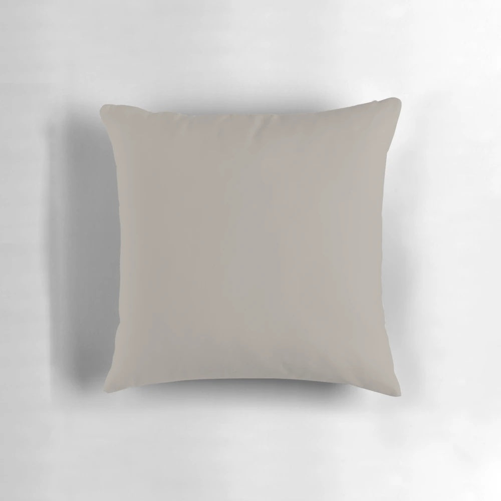 Taupe solid color pillow with a simple, minimalist abstract design inspired by nature
