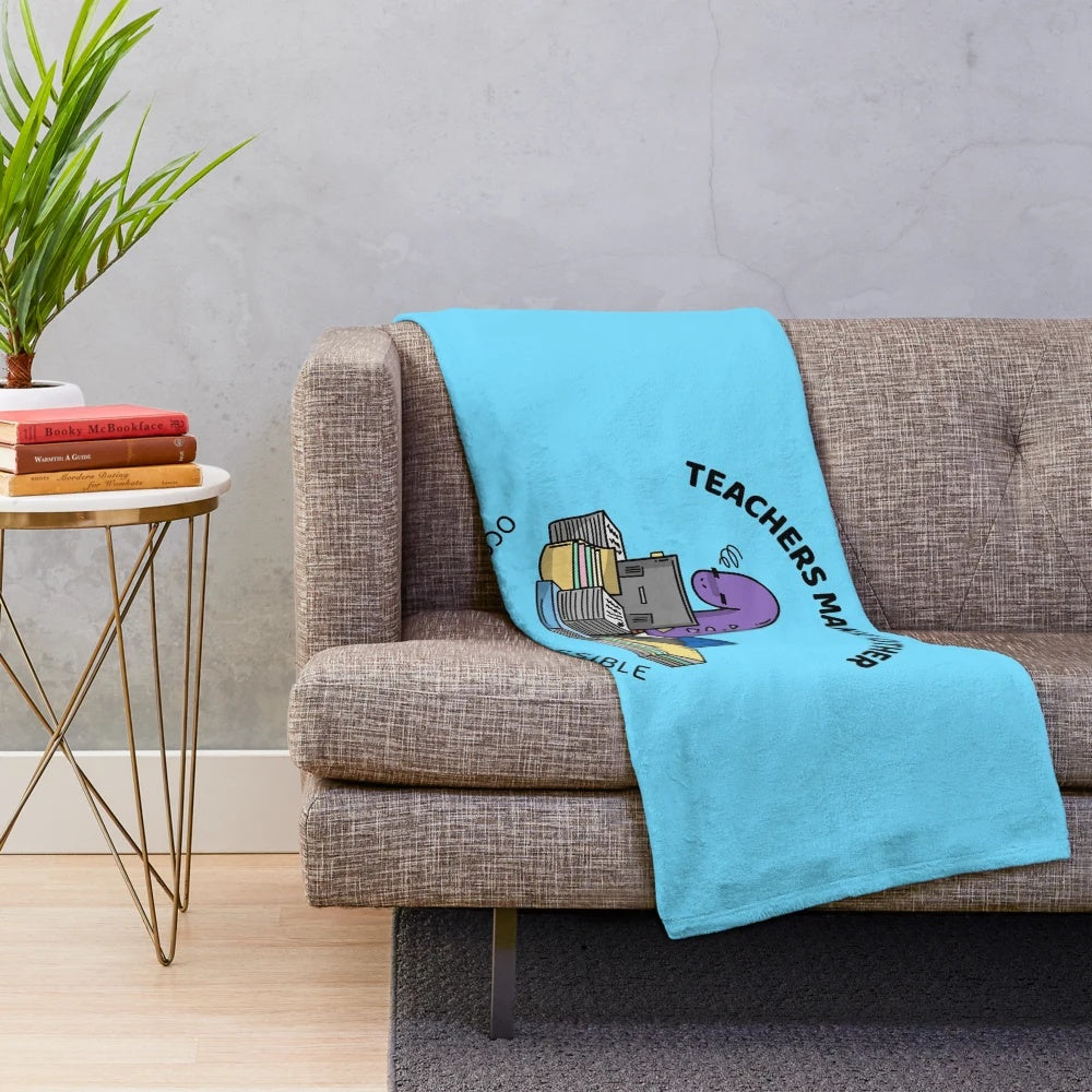 Plush blanket with the text "Teachers make all other occupations possible