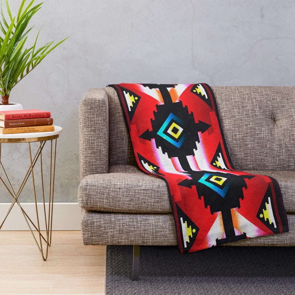 Teal plush blanket with tribal pattern and native american inspired geometric design