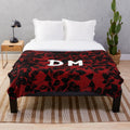 Textured plush blanket in black and red colors, inspired by Depeche Mode's Violator album