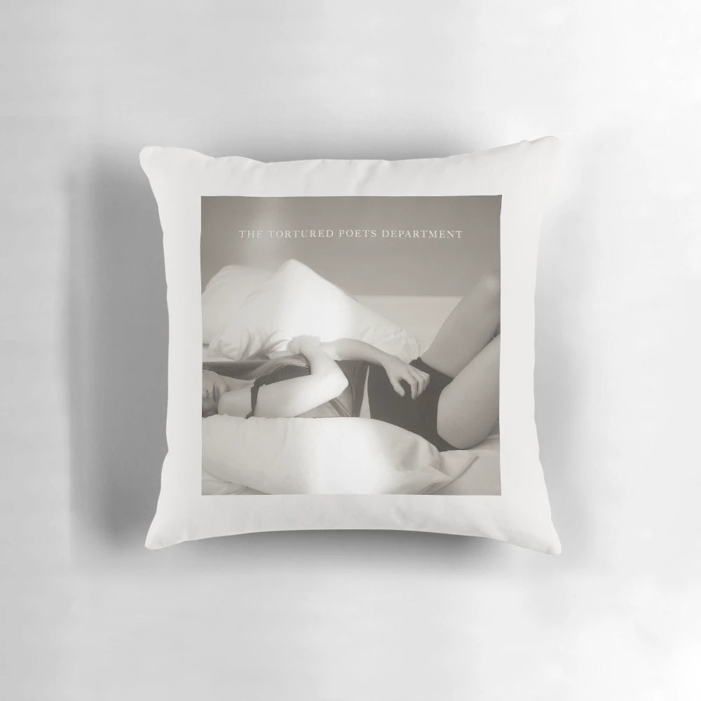 A stylish and comfortable pillow featuring the album cover art of Taylor Swift's "The Tortured Poets Department" release.