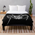 Plush blanket featuring a spider-like creature inspired by the 1982 film "The Thing