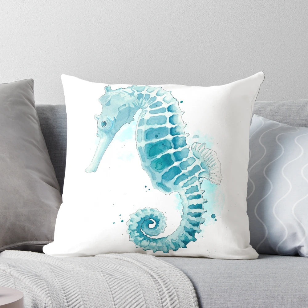 Watercolor painting of a seahorse on a decorative throw pillow for coastal home decor
