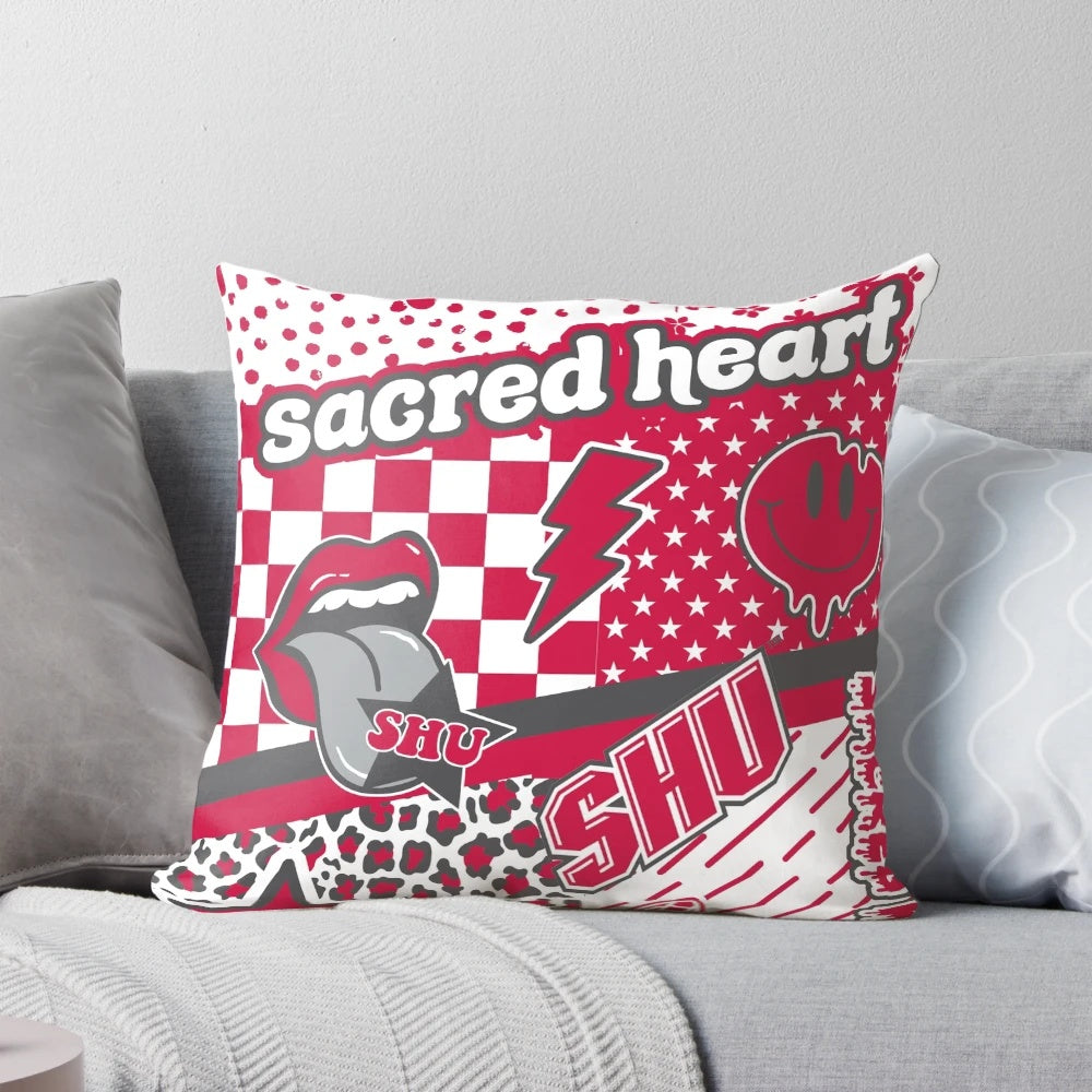 A vibrant sacred heart throw pillow with butterfly, floral, and animal print accents.