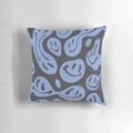A vibrant smiley face pillow with a trendy, grunge aesthetic