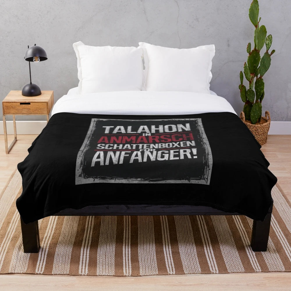 Plush blanket featuring an urban shadowboxing design for youth culture and pop culture enthusiasts