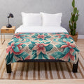 Coral and teal island blooms plush blanket with polynesian art and tropical floral pattern