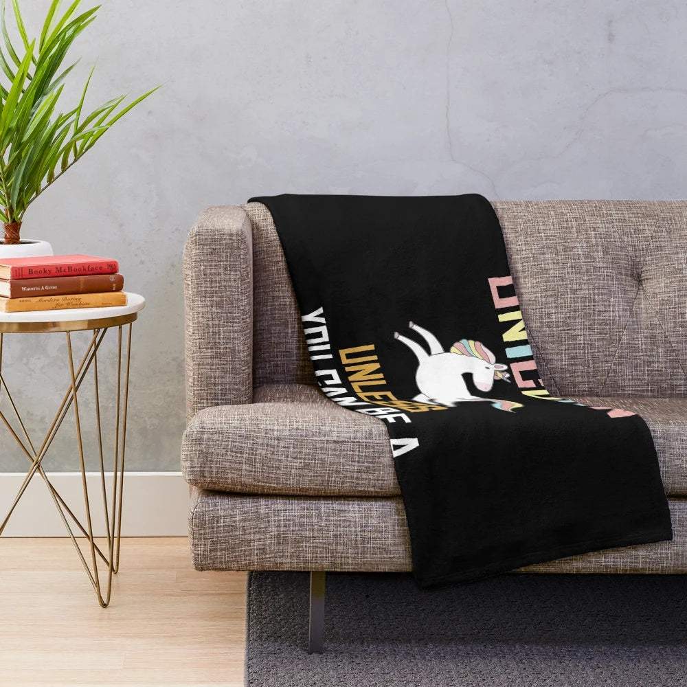 Plush blanket with a unicorn design and text "Be a unicorn unless you can be a data analyst