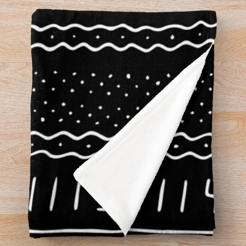 African-inspired plush blanket with tribal patterns