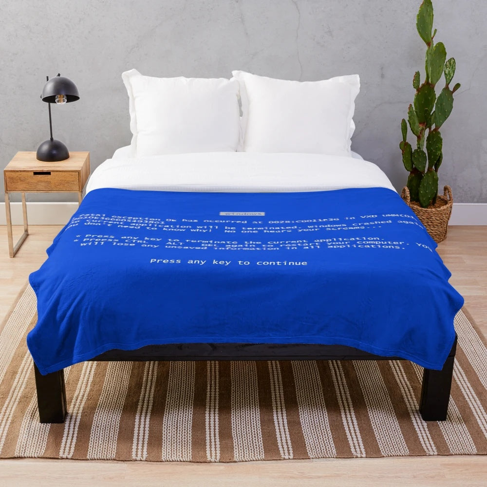 Blue screen of death themed plush blanket