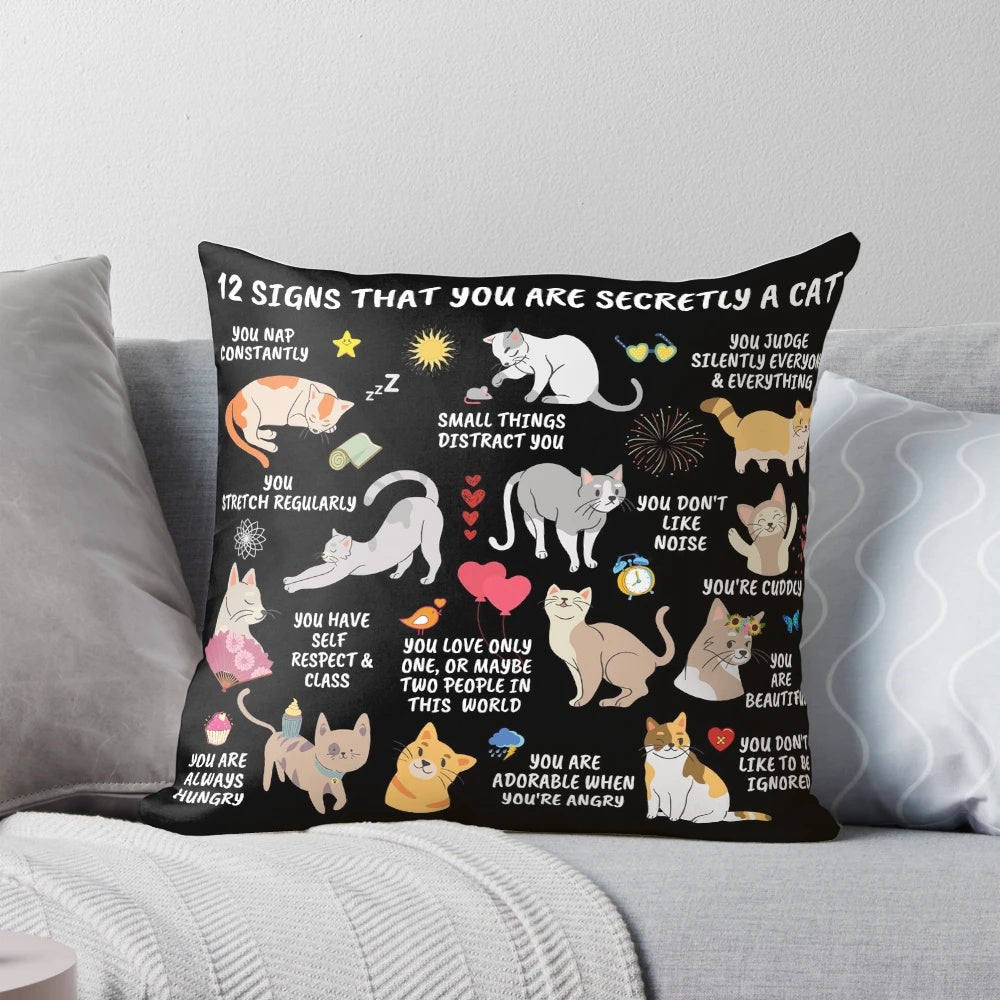 Assortment of cat-themed gifts including a notebook, pillow, and home decor items