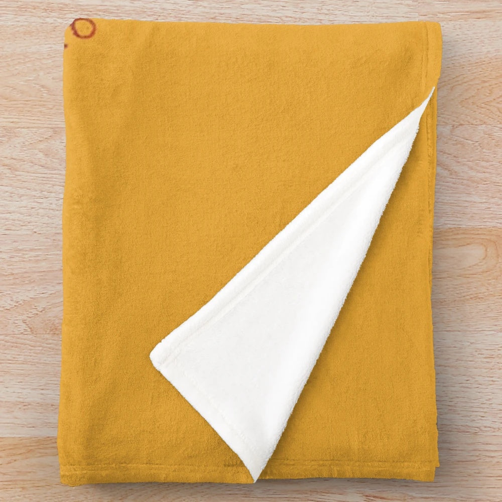 Afro-inspired plush blanket with vibrant patterns and textures