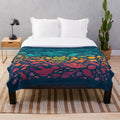 Vibrant Aquatic Spectrum Plush Blanket featuring a variety of colorful sea life