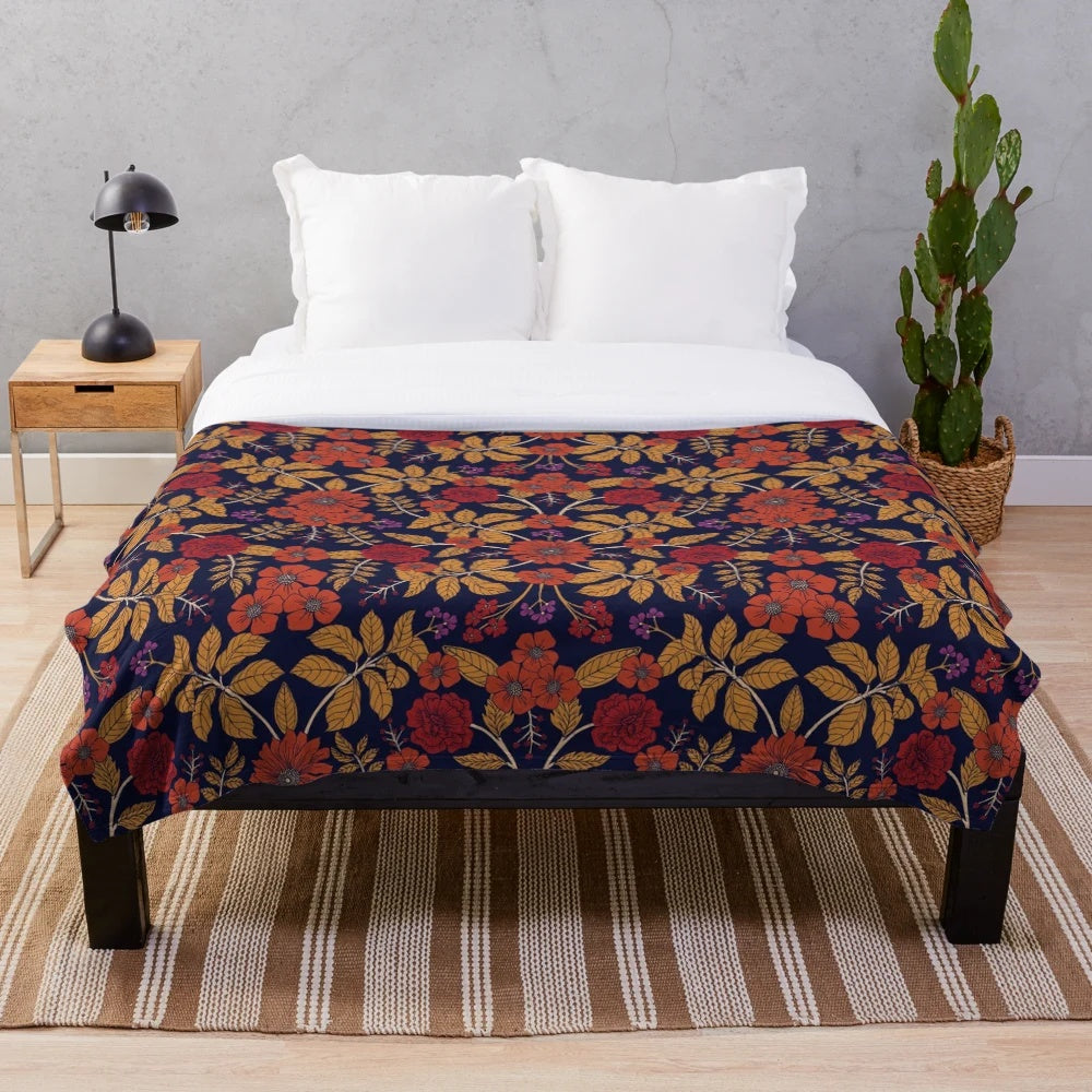 Autumn floral plush blanket with a colorful, botanical design