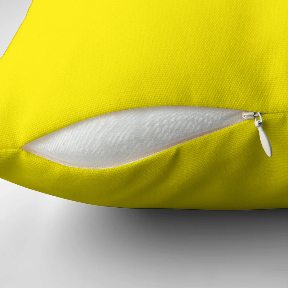 Vibrant canary yellow pillow with a range of yellow shades