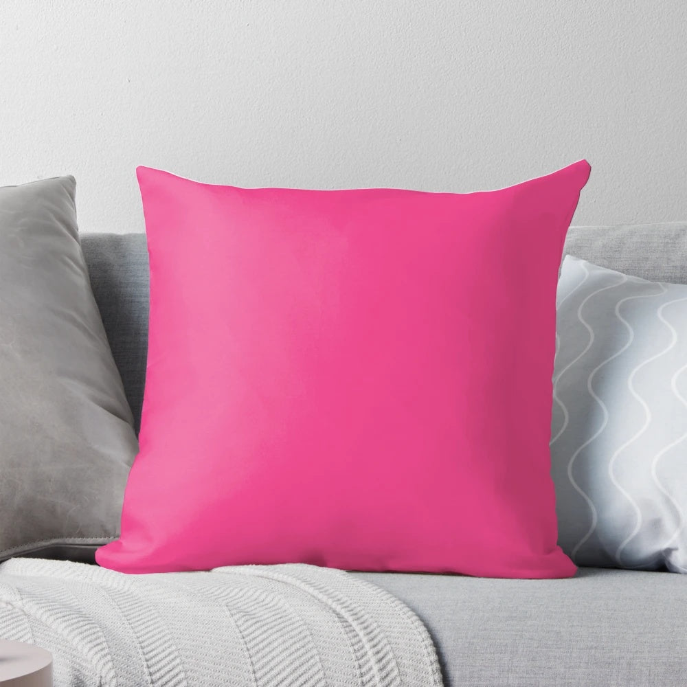 Cerise pink pillow with a variety of pink shades