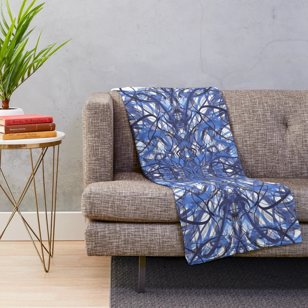 Plush blanket with digital symmetry design in blue tones
