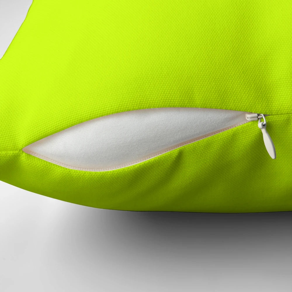 A vibrant electric lime green solid color accent pillow for a stylish home decor touch.