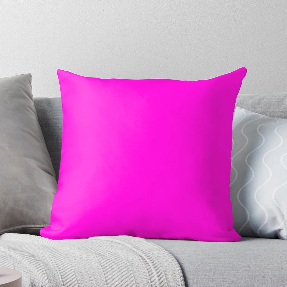 Fluorescent pink pillow with a solid, bold color design