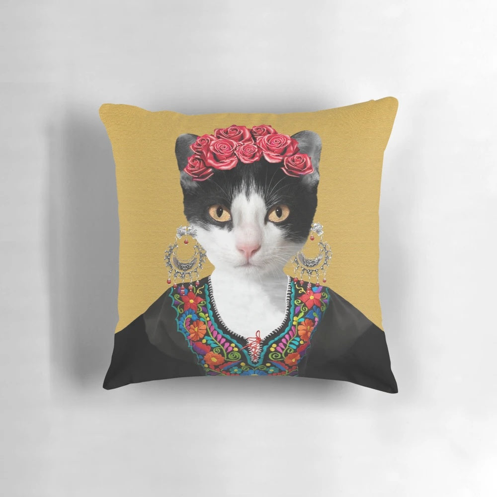 Colorful floral pillow featuring a portrait of Frida Kahlo with a black cat, highlighting the artist's feminist and feline-inspired artwork.