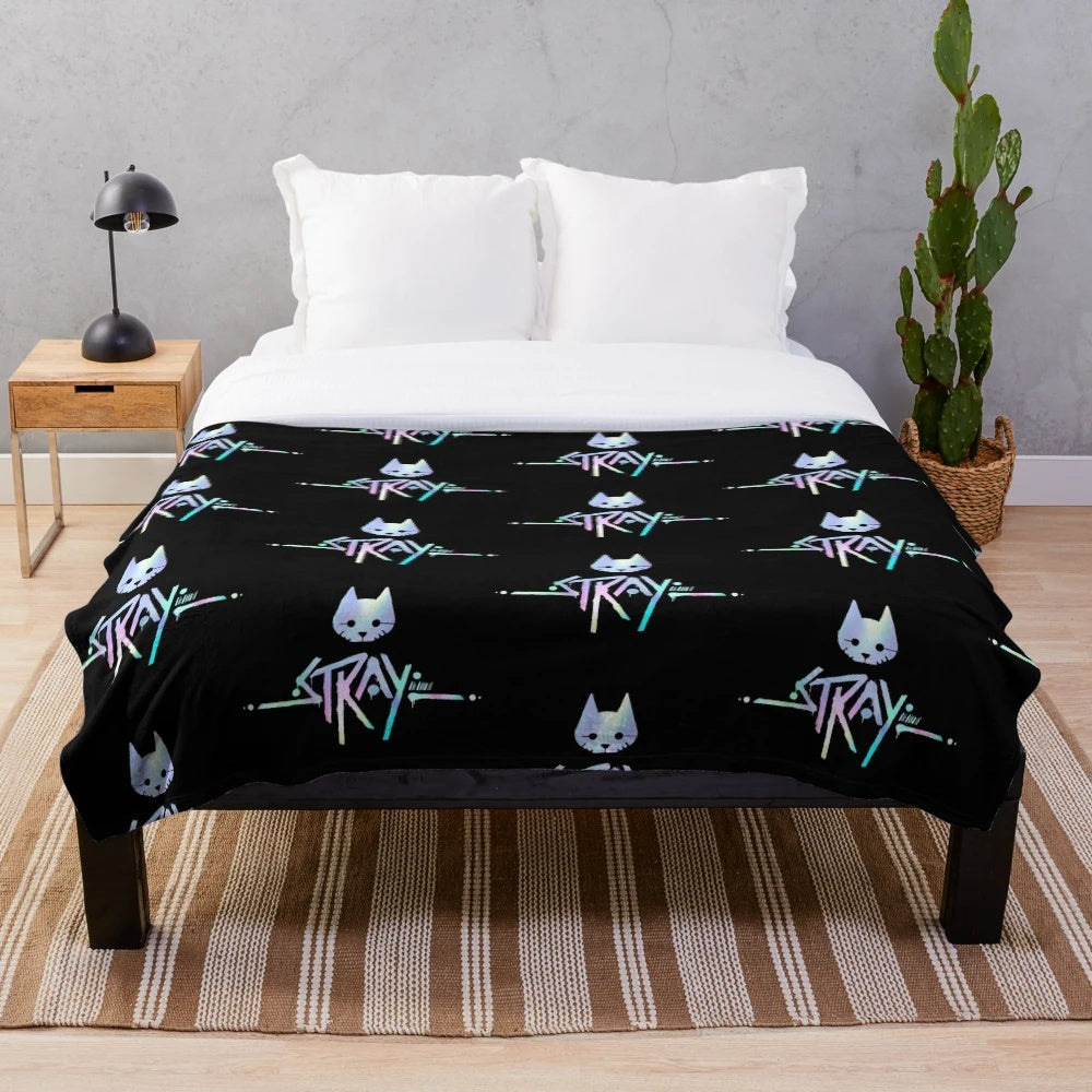 Holographic iridescent plush blanket featuring the iconic Stray game logo in a pastel color palette