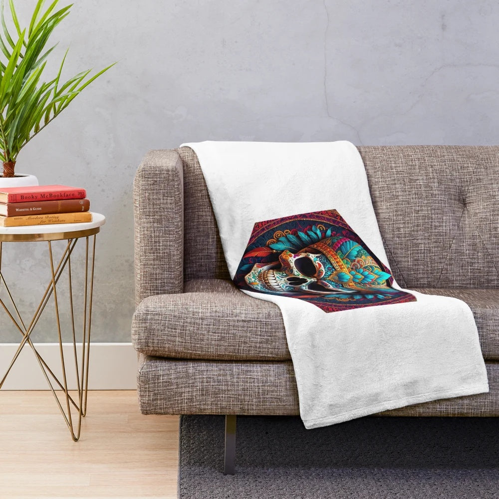 Colorful plush blanket featuring a skull design inspired by traditional Indian tribal patterns