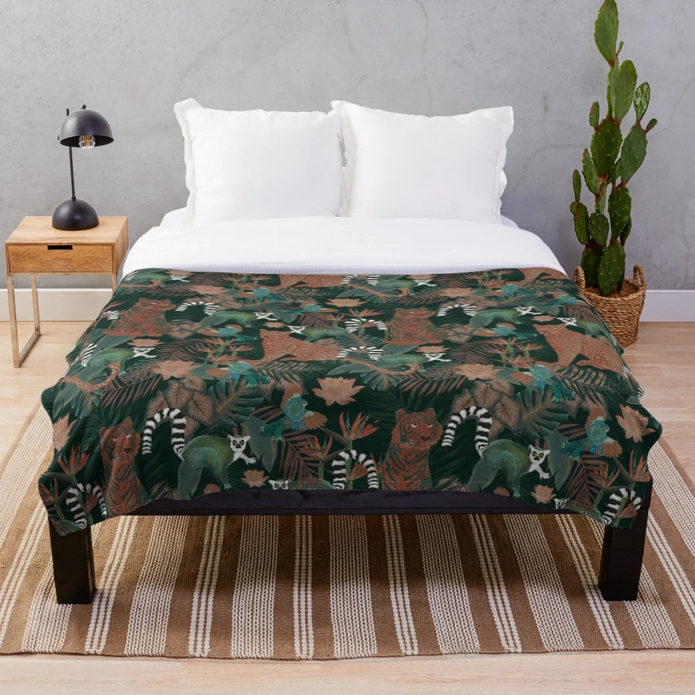 Plush jungle-themed blanket with tropical wildlife, botanical prints, and vibrant colors
