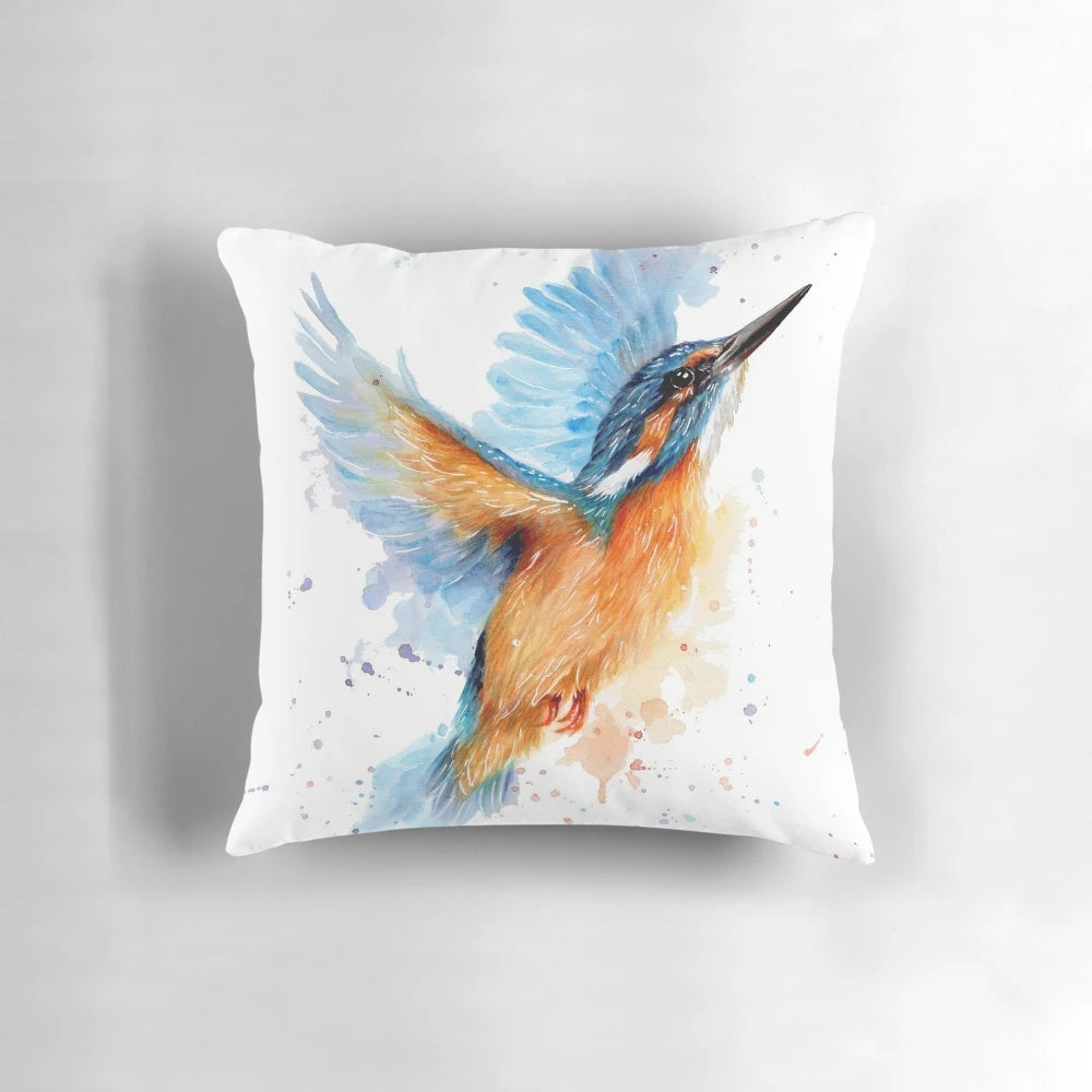 Colorful watercolor painting of a kingfisher bird on a decorative throw pillow