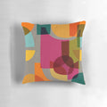 Vibrant multi-colored mid-century modern kaleidoscope pattern pillow for stylish home decor