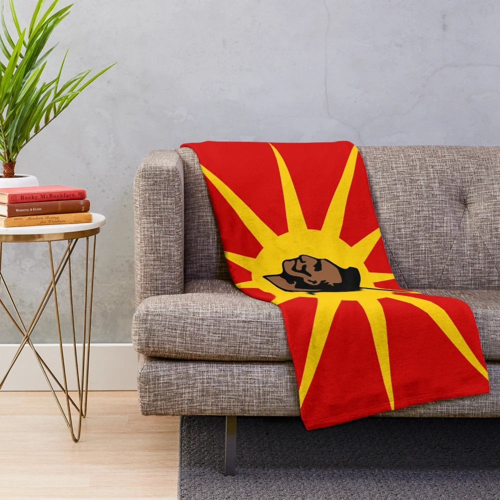 Mohawk-inspired plush blanket with vibrant red and yellow colors