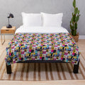 Colorful plush blanket featuring a musical theatre collage design