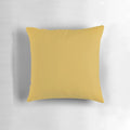 Mustard yellow decorative throw pillow with a vibrant, modern color and pattern