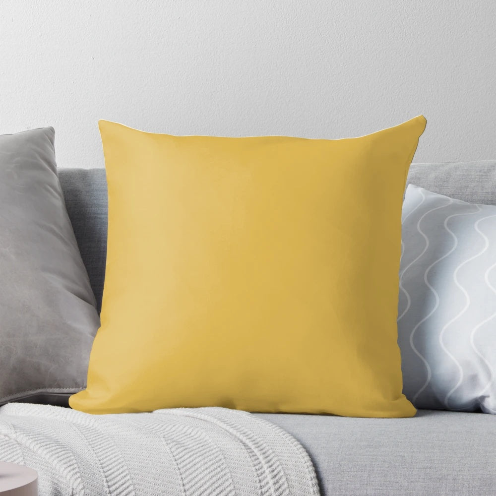 Mustard yellow decorative throw pillow with a vibrant, modern color and pattern