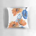 A colorful decorative pillow featuring an eye-catching orange and blue poppy design, perfect for adding a touch of nature-inspired beauty to any room.